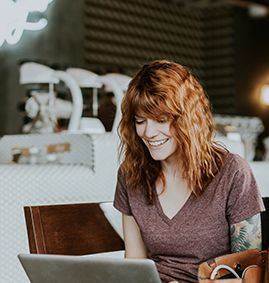 Woman on a laptop in a coffee shop